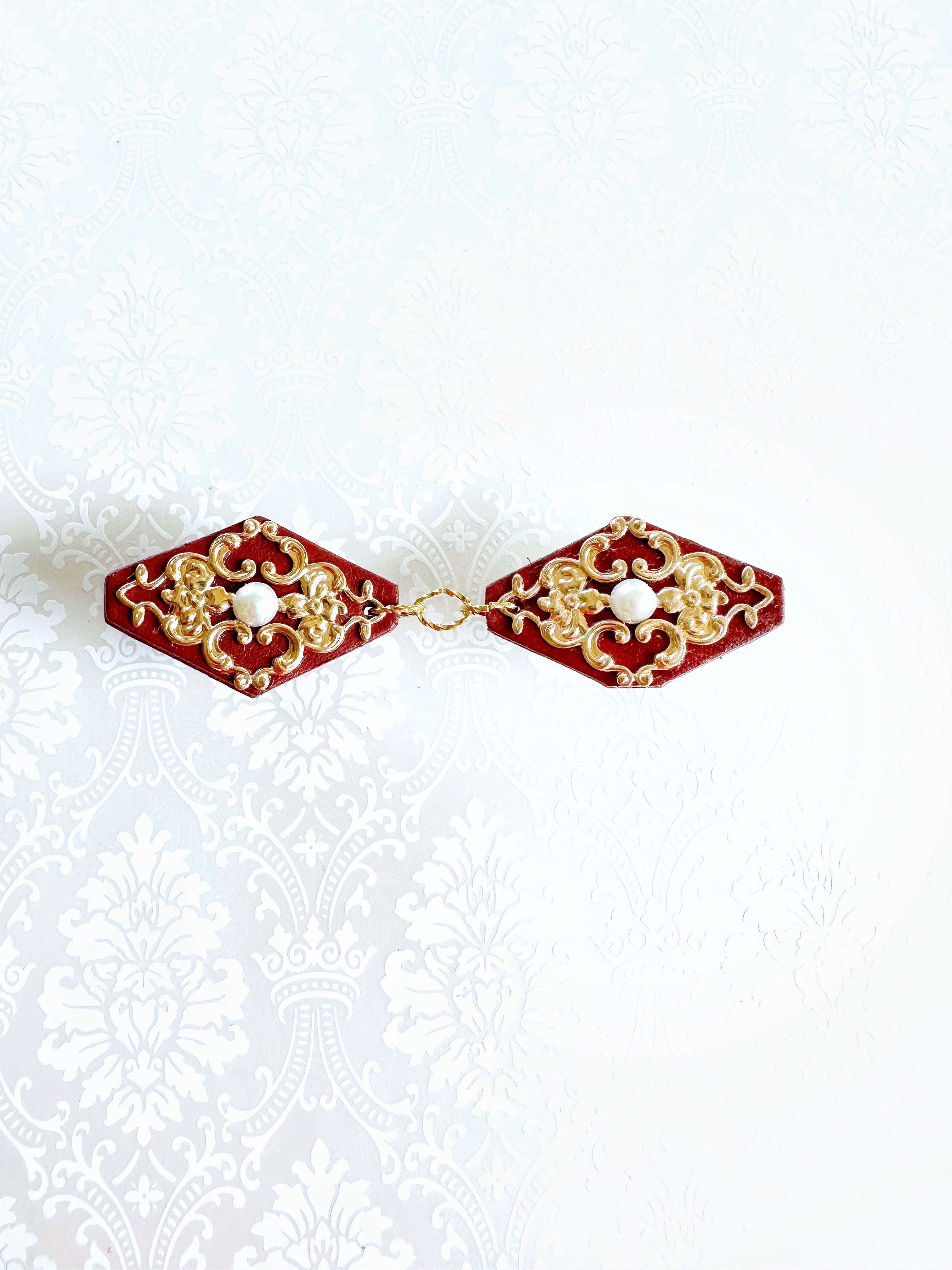 "Romantics" Gold on Red Leather Cinch Clips