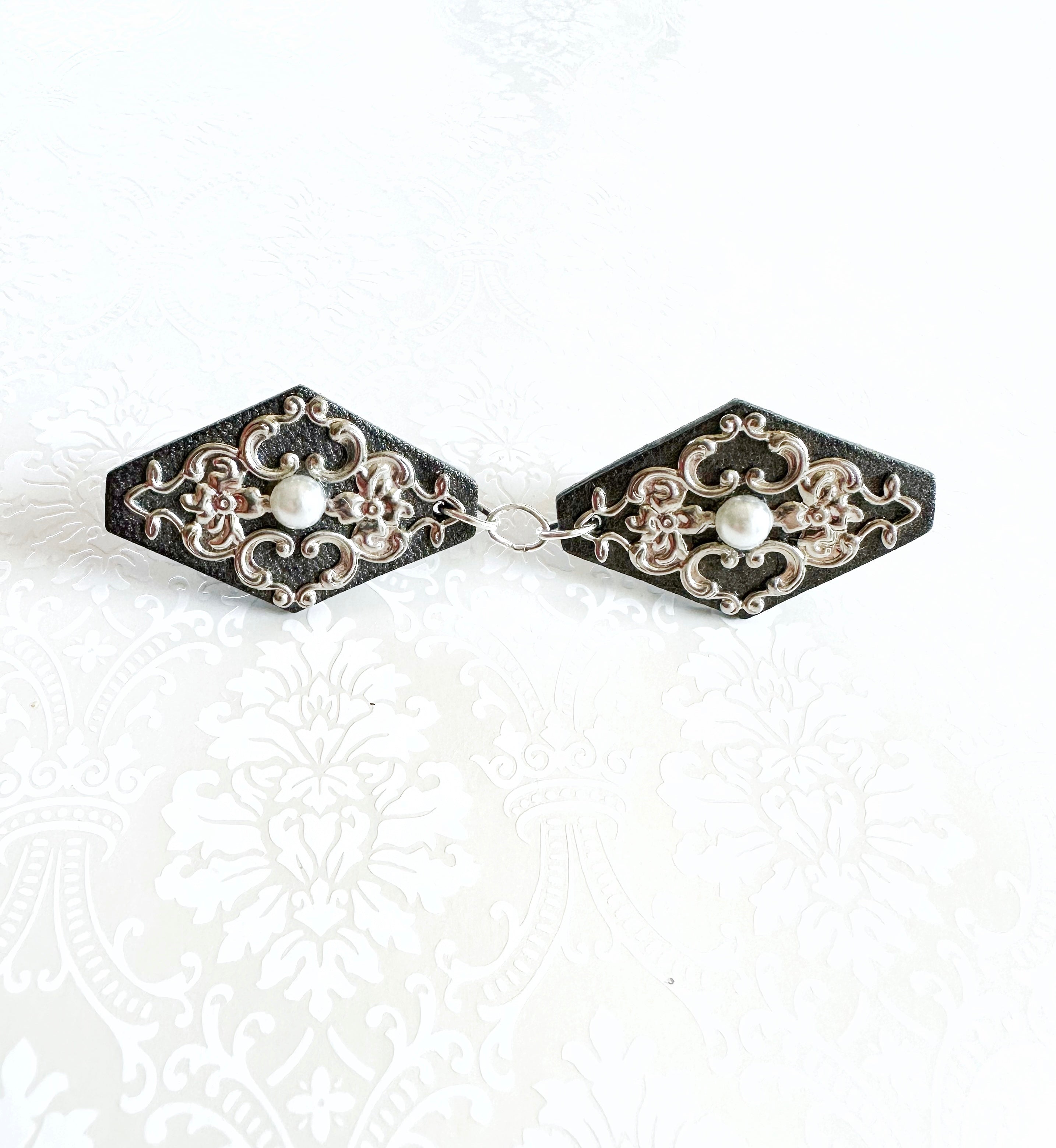 "Romantics" Silver on Silver-Gray Leather Cinch Clips